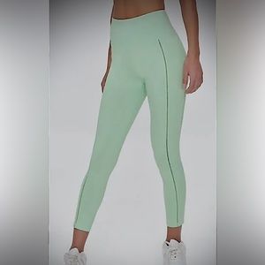 NWOT mint green corset looking stitched leggings some leg exposed!